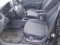 Second-hand Kia Rio 97 CP (71 kW) 2011 Negru Hatchback