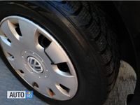 Second-hand VW Touran 115 CP (84 kW) 2004 Negru Monovolum