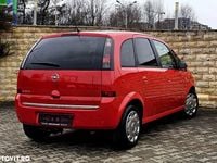 Second-hand Opel Meriva 100 CP (73 kW) 2009 Culoarerosu Monovolum