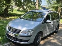 Second-hand VW Touran 104 CP (76 kW) 2010 Argintiu Monovolum