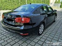 Second-hand VW Jetta 105 CP (77 kW) 2011 Negru Berlinǎ