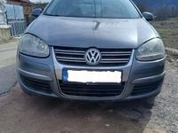 Second-hand VW Jetta 105 CP (77 kW) 2009 Gri Berlinǎ