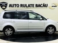 Second-hand VW Touran 105 CP (77 kW) 2008 Culoarenegru Monovolum