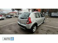 Second-hand Dacia Sandero 68 CP (50 kW) 2010 Argintiu Hatchback