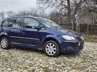 Second-hand VW Touran Highline 140 CP (102 kW) 2008 Culoarealbastru Monovolum