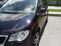 Second-hand VW Touran 105 CP (77 kW) 2009 Negru Monovolum