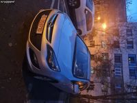 Second-hand Opel Astra 110 CP (80 kW) 2014 Gri Break