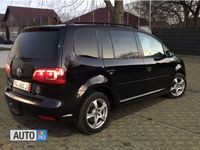Second-hand VW Touran 105 CP (77 kW) 2011 Negru Monovolum