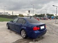 Second-hand BMW 320 177 CP (130 kW) 2009 Albastru Berlinǎ