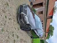 Second-hand VW Passat R-line 140 CP (102 kW) 2010 Maro Break