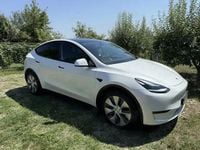 Second-hand Tesla Model Y 378 kW (514 CP) 2023 Alb SUV