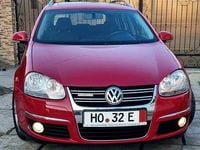 Second-hand VW Golf V Sportline 105 CP (77 kW) 2009 Culoarerosu Break