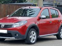 Second-hand Dacia Sandero Stepway 90 CP (66 kW) 2011 Roșu Hatchback