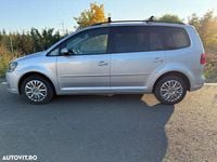 Second-hand VW Touran 140 CP (102 kW) 2011 Culoareargint Monovolum