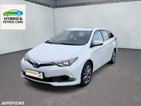 Second-hand Toyota Auris Hybrid 99 CP (72 kW) 2018 Culoarealb Break