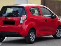 Second-hand Chevrolet Spark 65 CP (47 kW) 2011 Culoarerosu Hatchback