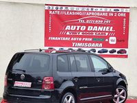 Second-hand VW Touran 105 CP (77 kW) 2009 Culoarenegru Monovolum