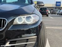 Second-hand BMW 520 Comfort Edition 184 CP (135 kW) 2014 Negru Berlinǎ