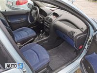 Second-hand Peugeot 206 75 CP (55 kW) 2003 Visiniu metalizat Coupe
