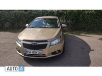 Second-hand Chevrolet Cruze 113 CP (83 kW) 2010 Auriu Berlinǎ
