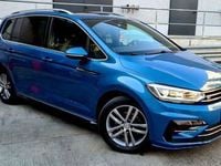 Second-hand VW Touran Highline 150 CP (110 kW) 2017 Albastru Monovolum