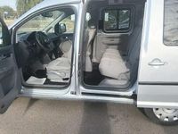 Second-hand VW Caddy 105 CP (77 kW) 2009 Argintiu Monovolum