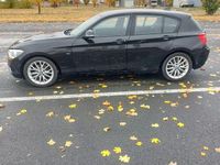 Second-hand BMW 116 Sport Line 136 CP (100 kW) 2012 Culoarenegru Hatchback