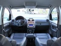 Second-hand VW Touran 131 CP (96 kW) 2008 Argintiu Monovolum
