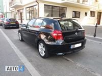 Second-hand BMW 118 143 CP (105 kW) 2009 Negru Hatchback