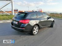 Second-hand Opel Astra Active 165 CP (121 kW) 2013 Negru Break