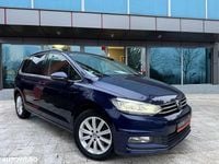 Second-hand VW Touran Highline 150 CP (110 kW) 2017 Culoarealbastru Monovolum