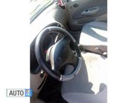 Second-hand Ford Fiesta 75 CP (55 kW) 1998 Rosu Hatchback