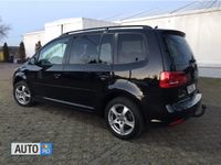 Second-hand VW Touran 105 CP (77 kW) 2011 Negru Monovolum