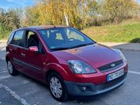 Second-hand Ford Fiesta 75 CP (55 kW) 2006 Roşu Hatchback