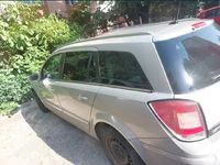 Second-hand Opel Astra 110 CP (80 kW) 2009 Auriu Coupe