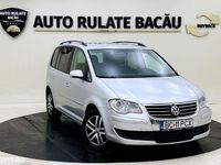 Second-hand VW Touran 105 CP (77 kW) 2008 Culoarenegru Monovolum