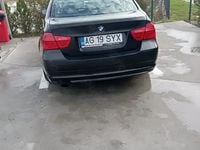 Second-hand BMW 318 143 CP (105 kW) 2010 Negru Berlinǎ