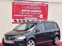 Second-hand VW Touran 105 CP (77 kW) 2009 Culoarenegru Monovolum