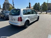 Second-hand VW Touran Conceptline 90 CP (66 kW) 2008 Gri Monovolum