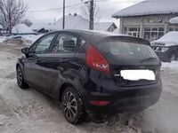 Second-hand Ford Fiesta 70 CP (51 kW) 2010 Negru Berlinǎ