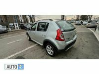 Second-hand Dacia Sandero 68 CP (50 kW) 2010 Argintiu Hatchback