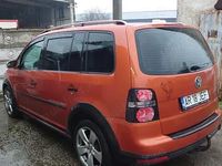 Second-hand VW Touran 140 CP (102 kW) 2008 Portocaliu Monovolum