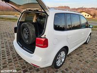 Second-hand VW Touran Style 105 CP (77 kW) 2011 Alb Monovolum