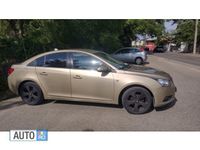 Second-hand Chevrolet Cruze 113 CP (83 kW) 2010 Auriu Berlinǎ