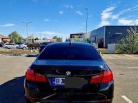 Second-hand BMW 520 184 CP (135 kW) 2011 Negru Berlinǎ