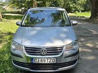 Second-hand VW Touran 104 CP (76 kW) 2010 Argintiu Monovolum
