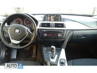 Second-hand BMW 316 143 CP (105 kW) 2014 Negru Break