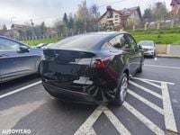Second-hand Tesla Model Y 378 kW (514 CP) 2021 Culoarenegru SUV
