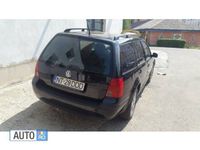 Second-hand VW Golf IV 105 CP (77 kW) 2002 Negru Break