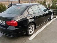 Second-hand BMW 318 143 CP (105 kW) 2010 Negru Berlinǎ